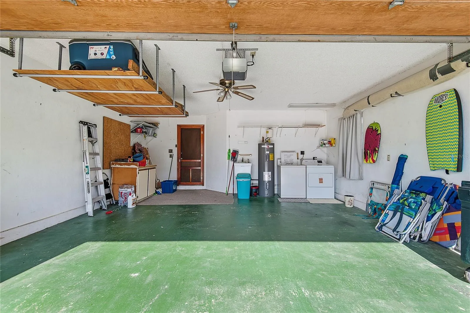 Two car garage with washer and dryer