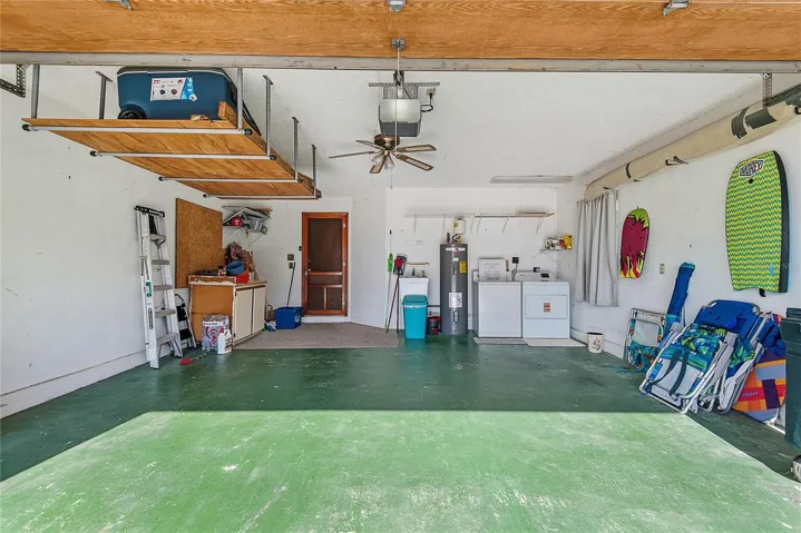 Two car garage with washer and dryer