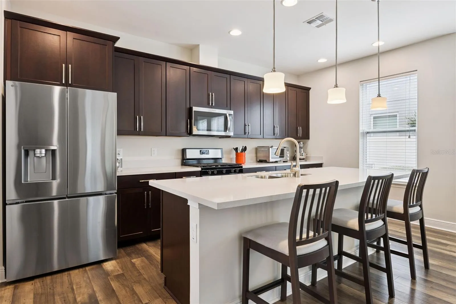 Chef's Kitchen with 9 foot island and 24 inch custom cabinets