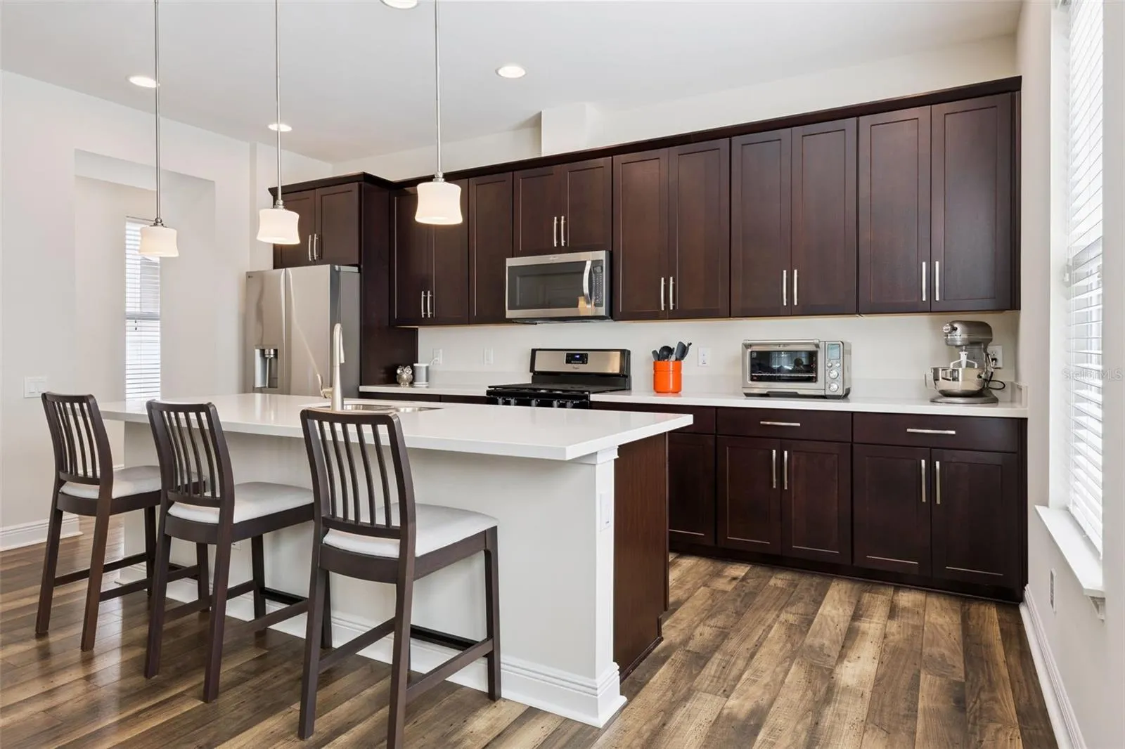 Chef's Kitchen with 9 foot island and 24 inch custom cabinets