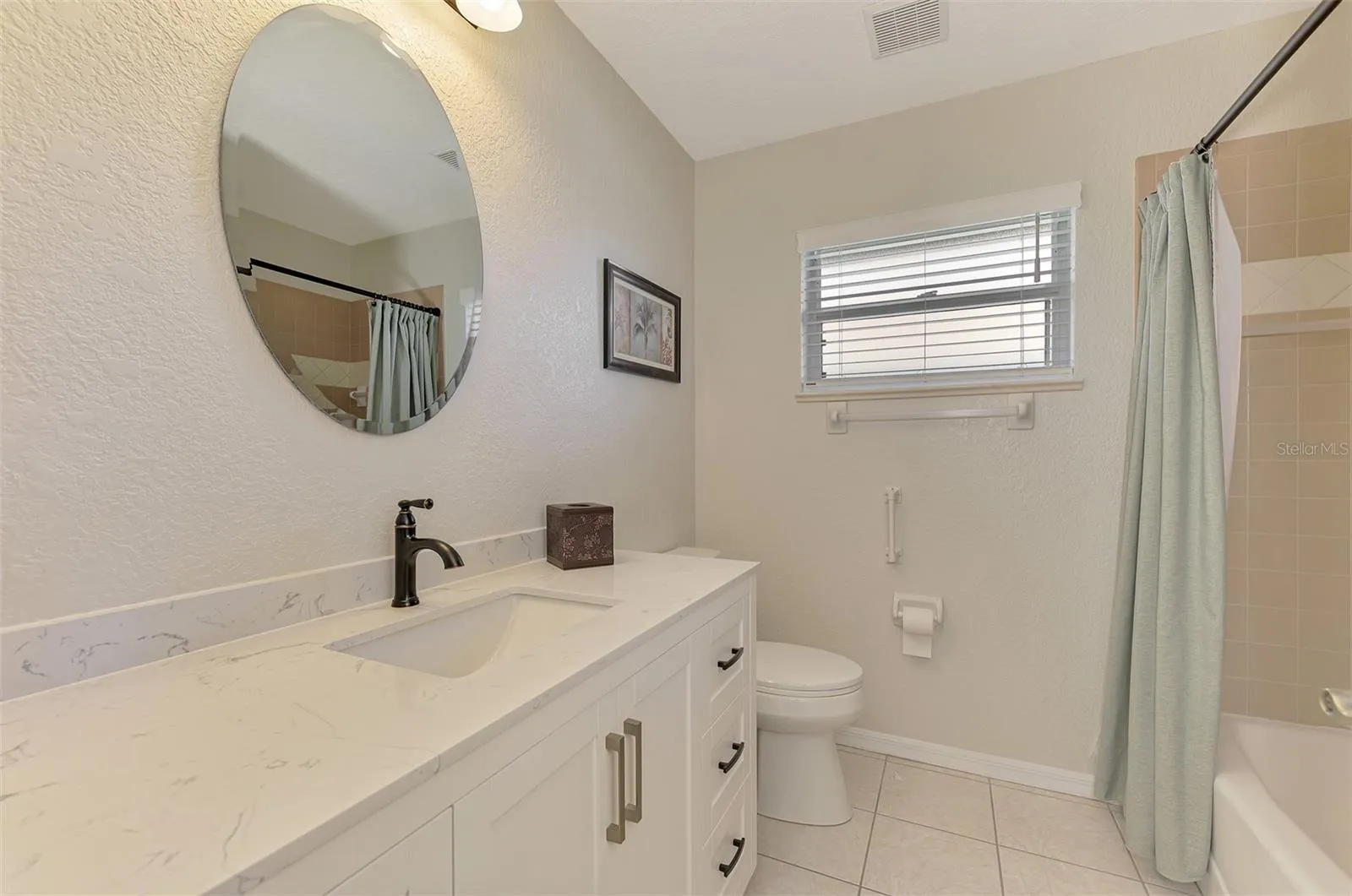 Guest bath with modern cabinets and sink