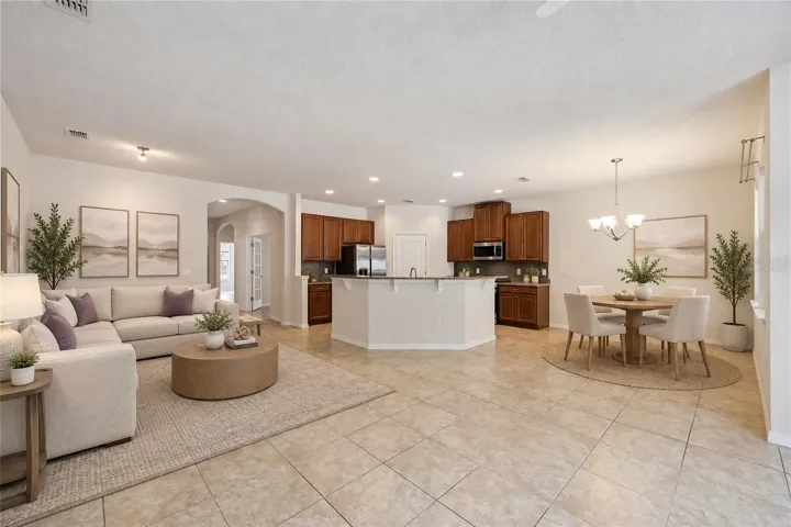 Living/dining room/kitchen combo -Virtually Staged