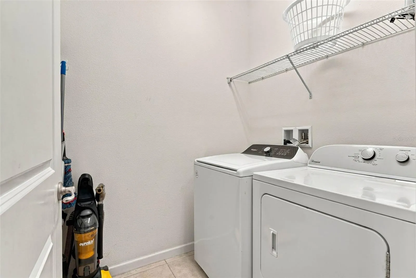 Inside laundry room.