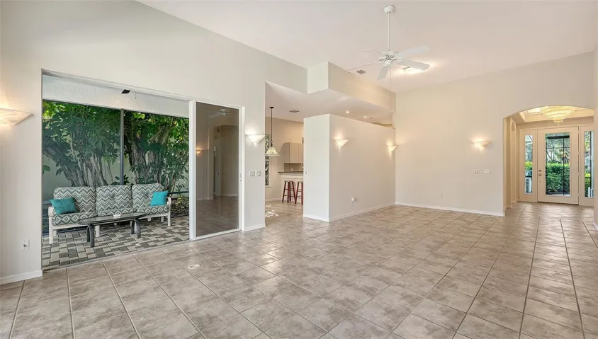 Open floor plan with sliding glass door to covered portion of the lanai