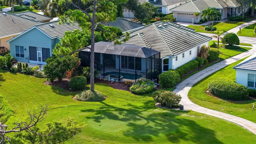 Lanai with pool and spa spans the back of the house