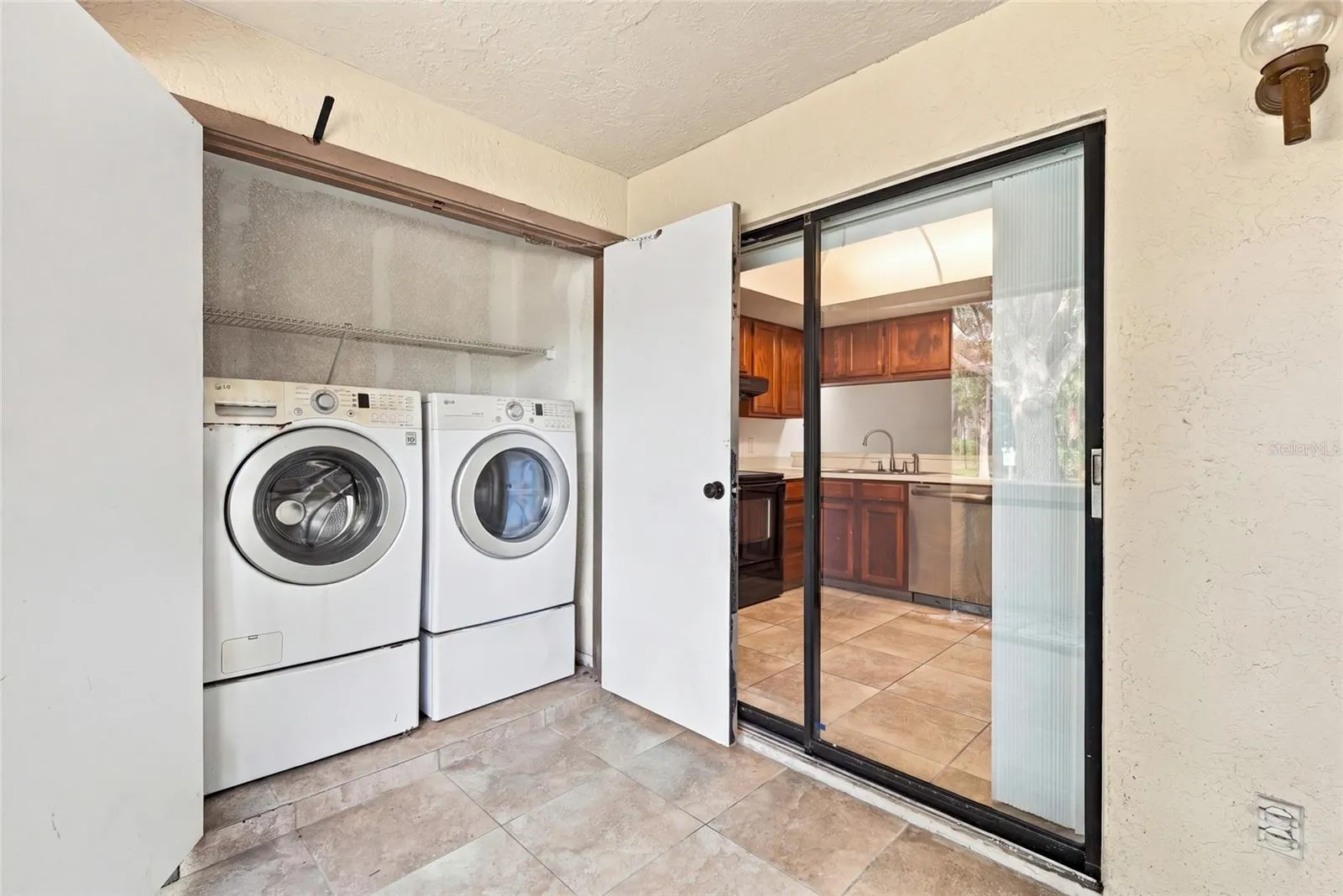 Front Screened in Patio with Laundry Closet