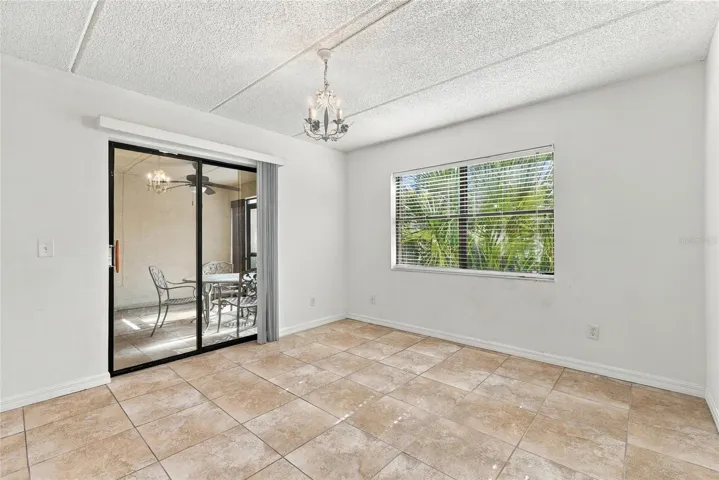 Primary Bedroom with Sliders to Back Patio