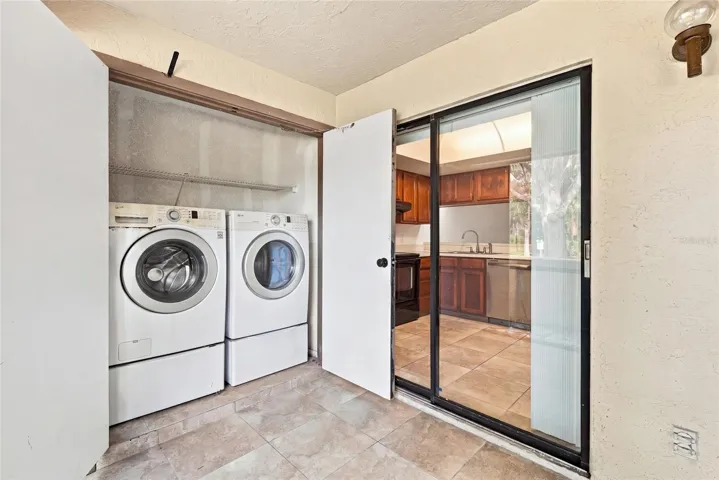 Front Screened in Patio with Laundry Closet