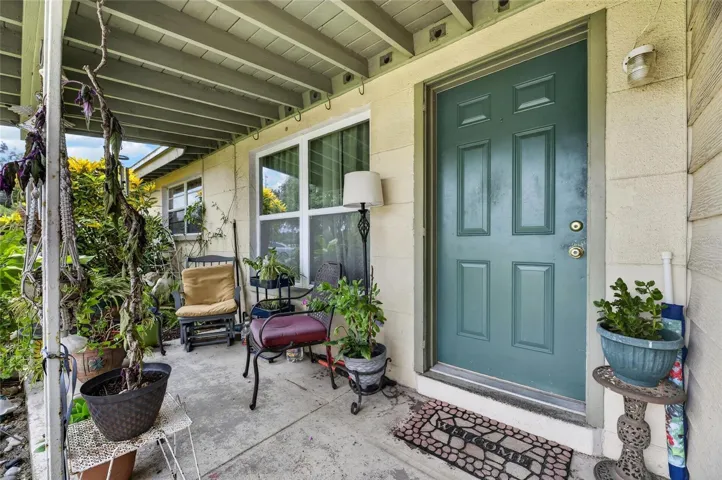 Adorable front porch for your plant babies and morning coffee