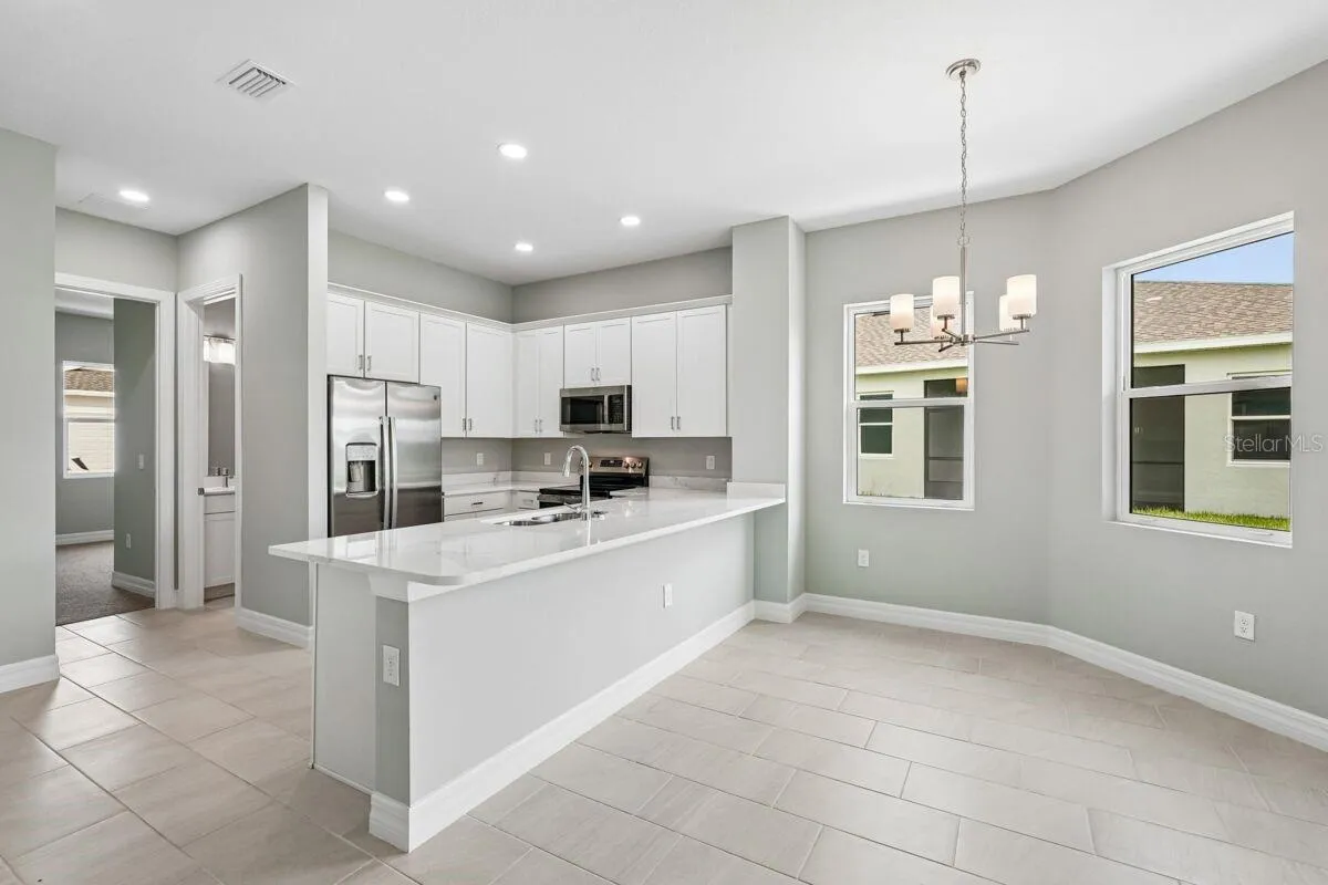 Kitchen-Photo description represents the model home of same floor plan.