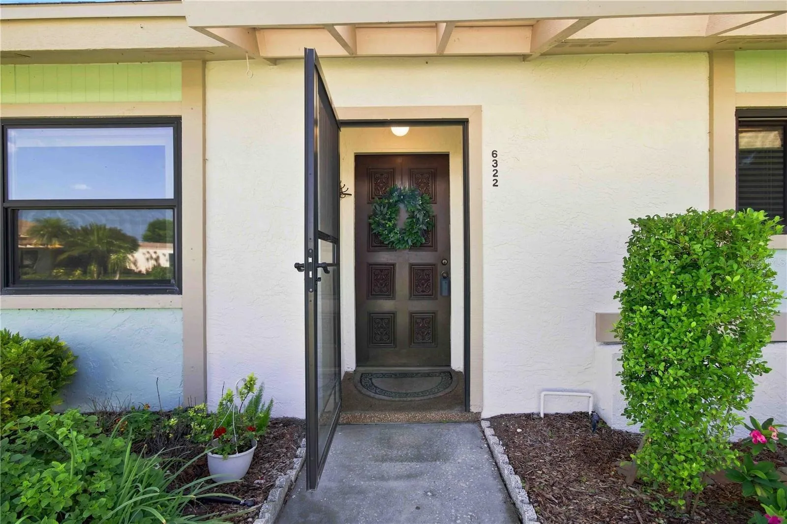FRONT PATIO WITH SCREEN DOOR