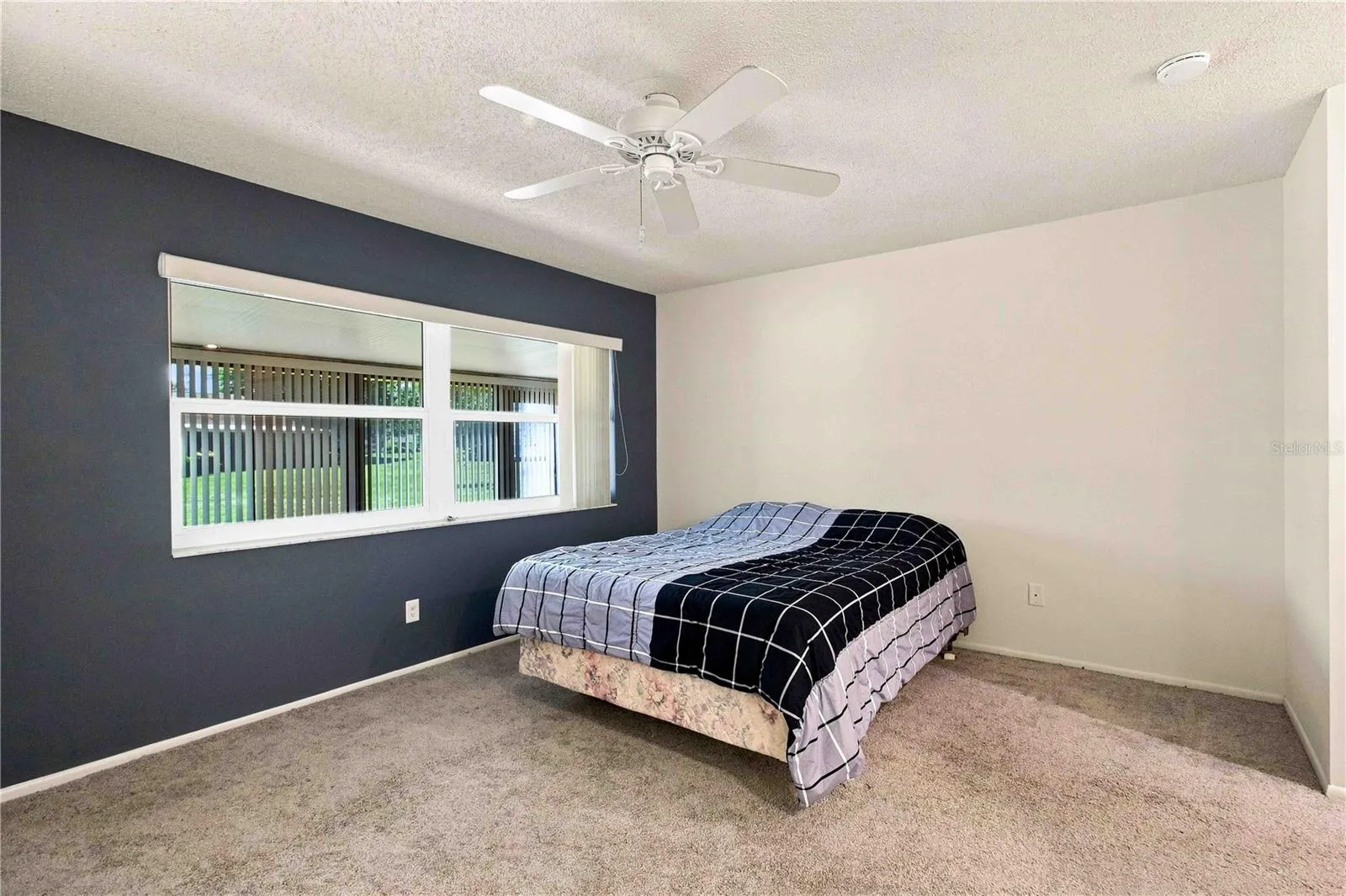 MASTER BEDROOM WITH HURRICANE WINDOWS