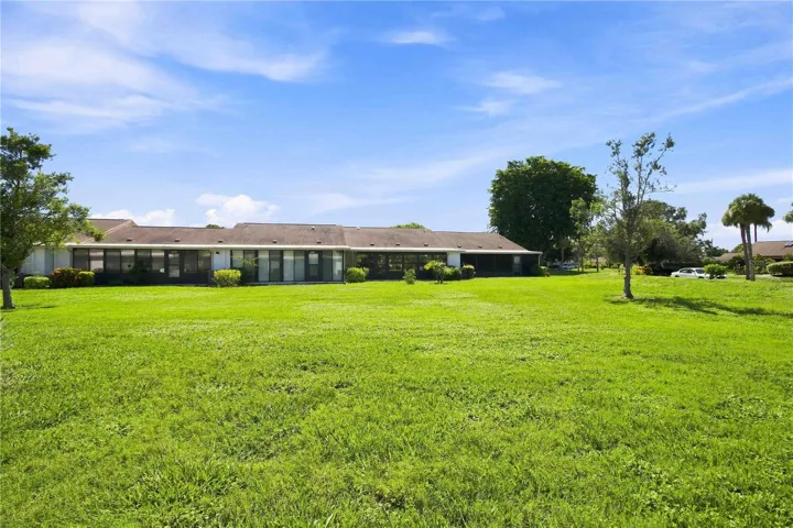 GRASSY FIELD OUTSIDE THE BACK PATIO GREAT FOR PETS