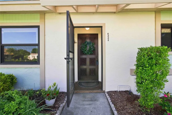 FRONT PATIO WITH SCREEN DOOR