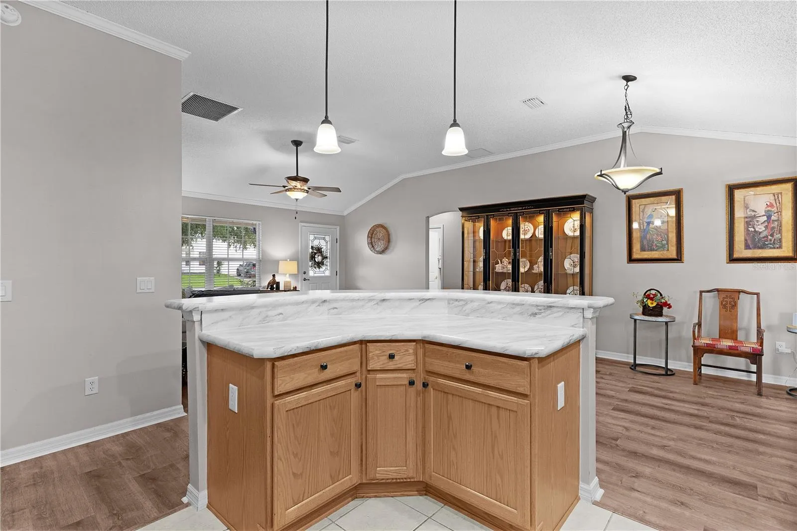 center island with cabinet drawers and pull out shelves