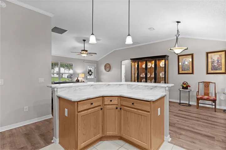 center island with cabinet drawers and pull out shelves