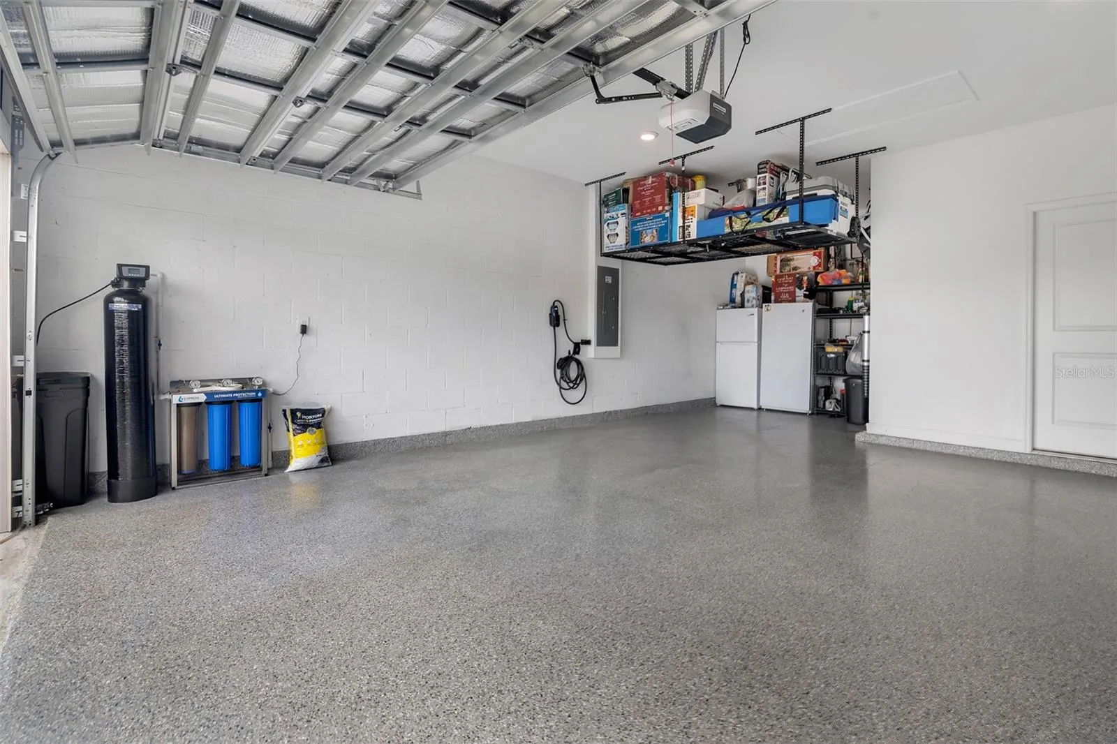 Garage with epoxy floor and storage
