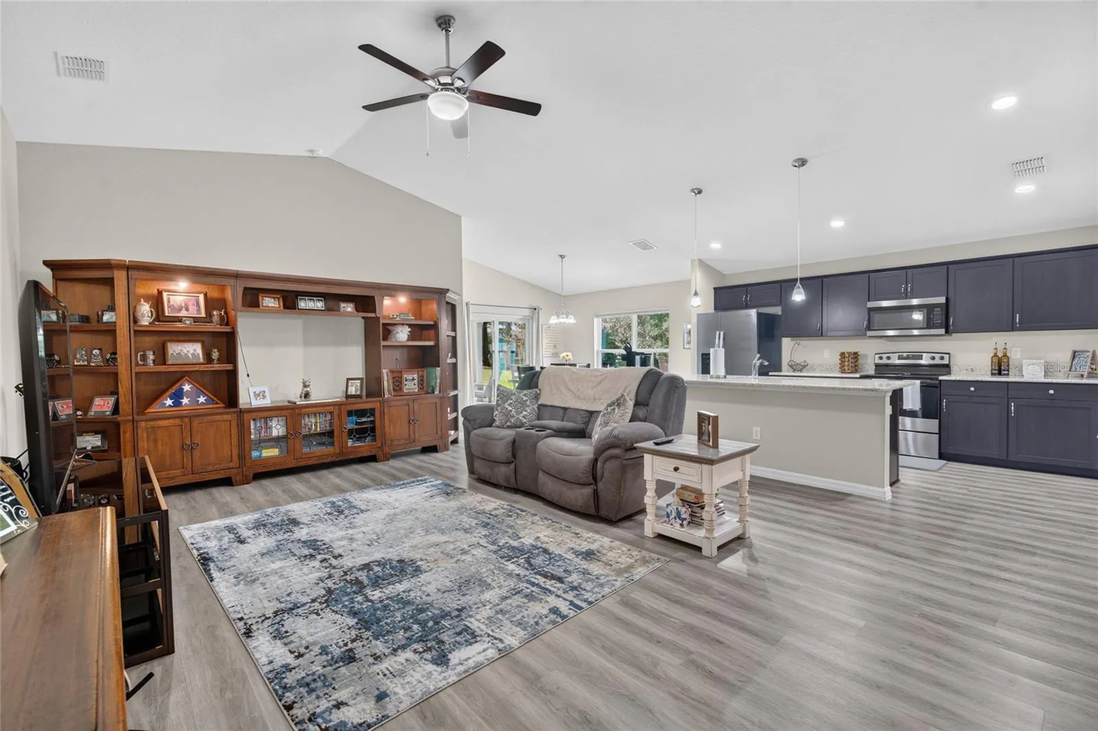 Living area with vaulted ceiling