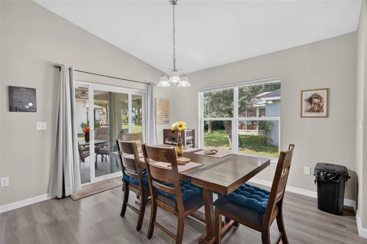 Dining area w Sliders to the back porch