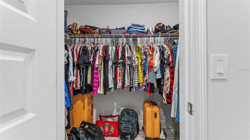 Primary suite two walk in closets.