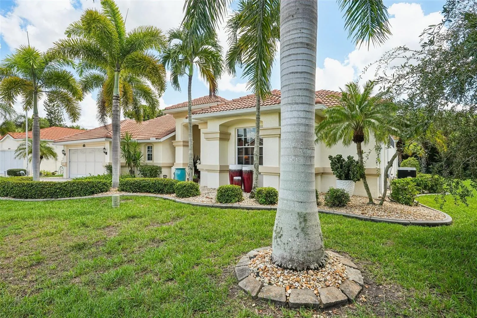 Mediterranean style coastal retreat with exceptional curb appeal and classic Florida charm