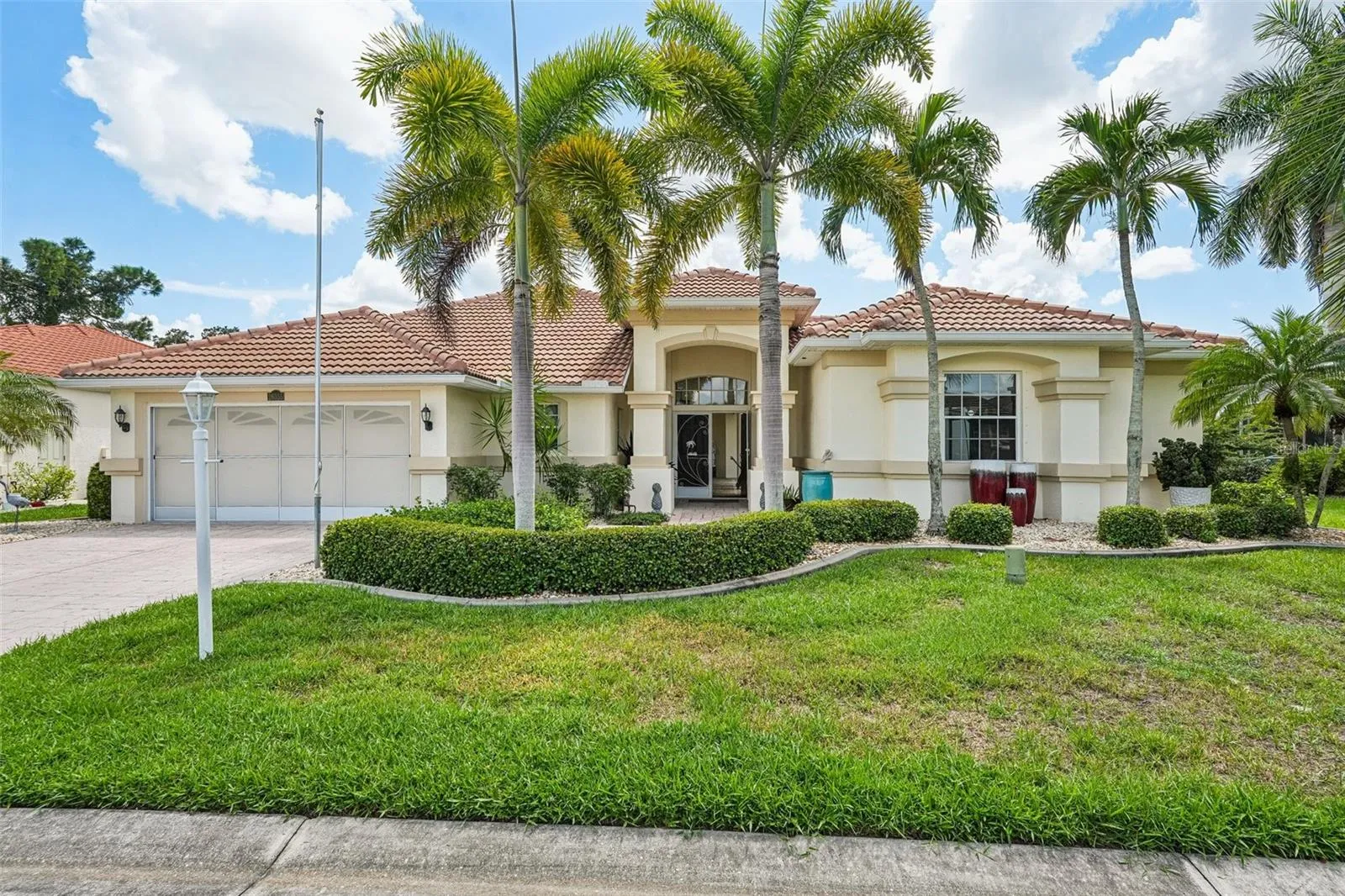 Mediterranean style coastal retreat with exceptional curb appeal and classic Florida charm