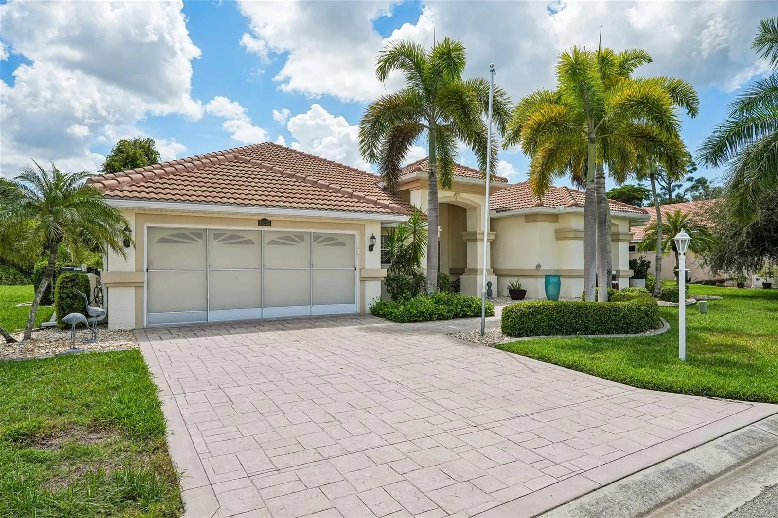 Mediterranean style coastal retreat with exceptional curb appeal and classic Florida charm