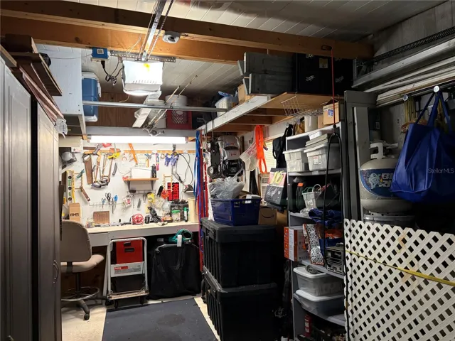 Garage showing workbench and storage