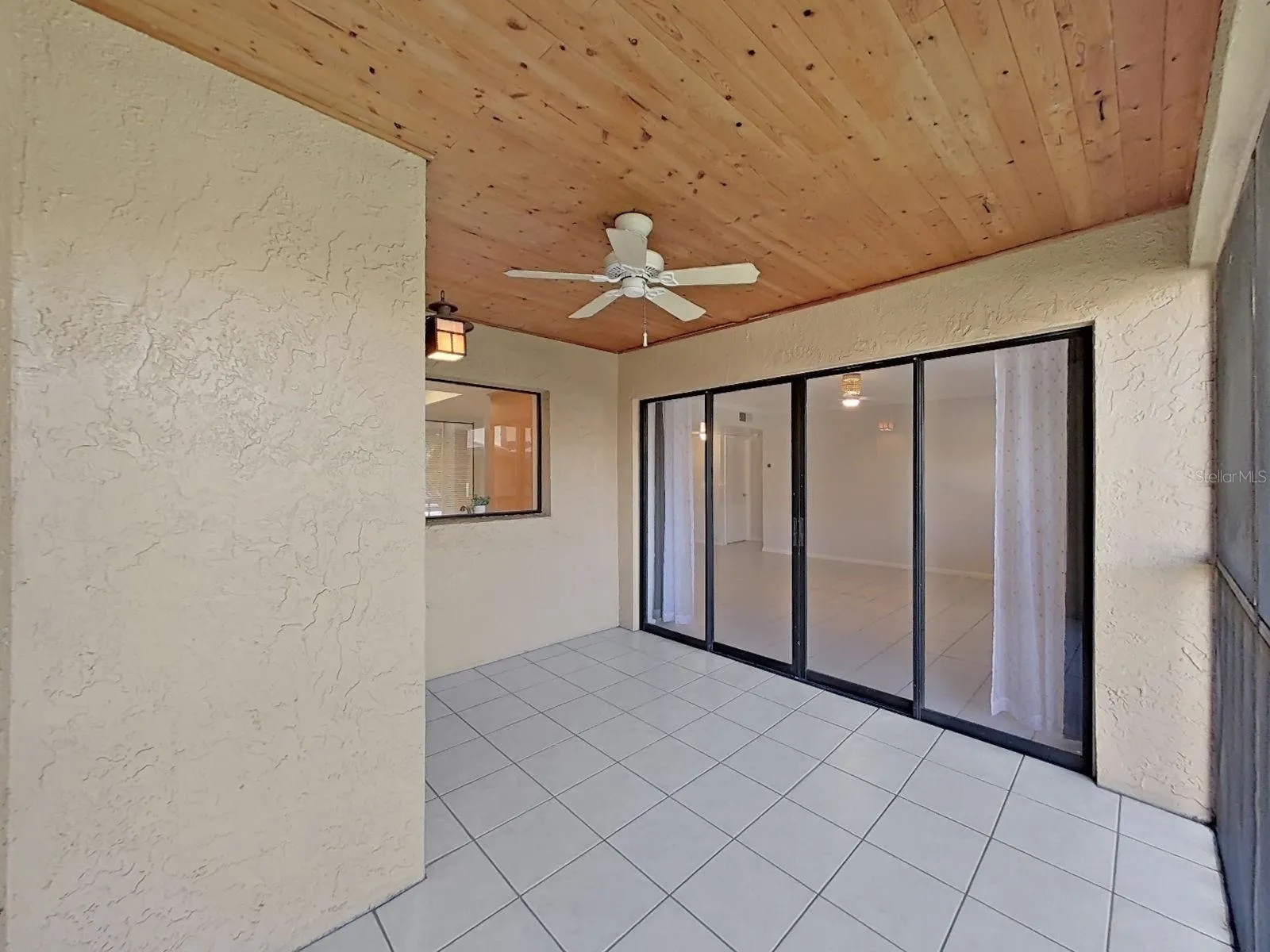SLIDERS FROM GREAT ROOM TO SCREENED LANAI