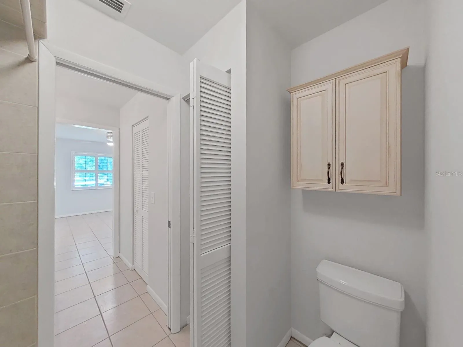 POCKET DOOR SLIDER SEPARATES THE TUB/TOILET AREA FROM SINK- MORE PRIVATE! MULTIPLE CLOSETS!