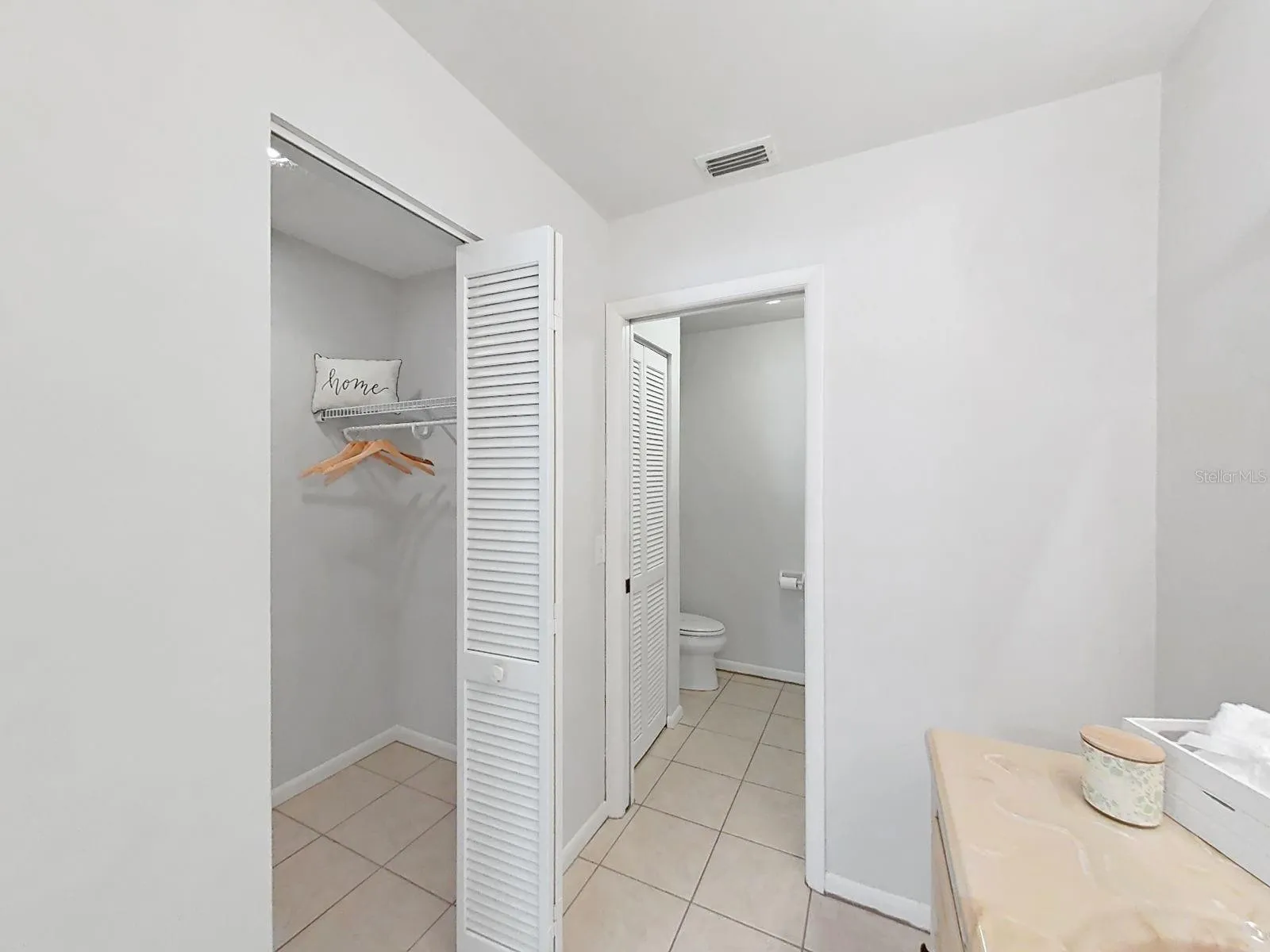 BEDROOM ENSUITE BATH- MULTIPLE CLOSETS &amp; PRIVATE TUB/TOILET AREA.