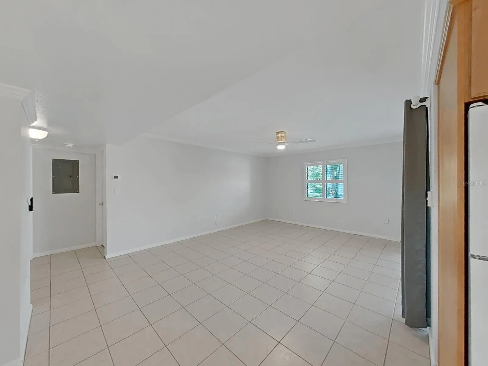 GREAT ROOM AND HALLWAY LEADING TO BEDROOM &amp; BATHROOMS