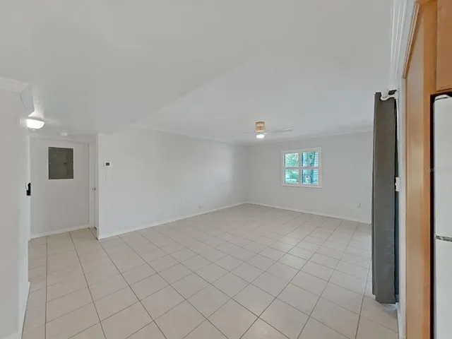 GREAT ROOM AND HALLWAY LEADING TO BEDROOM &amp; BATHROOMS
