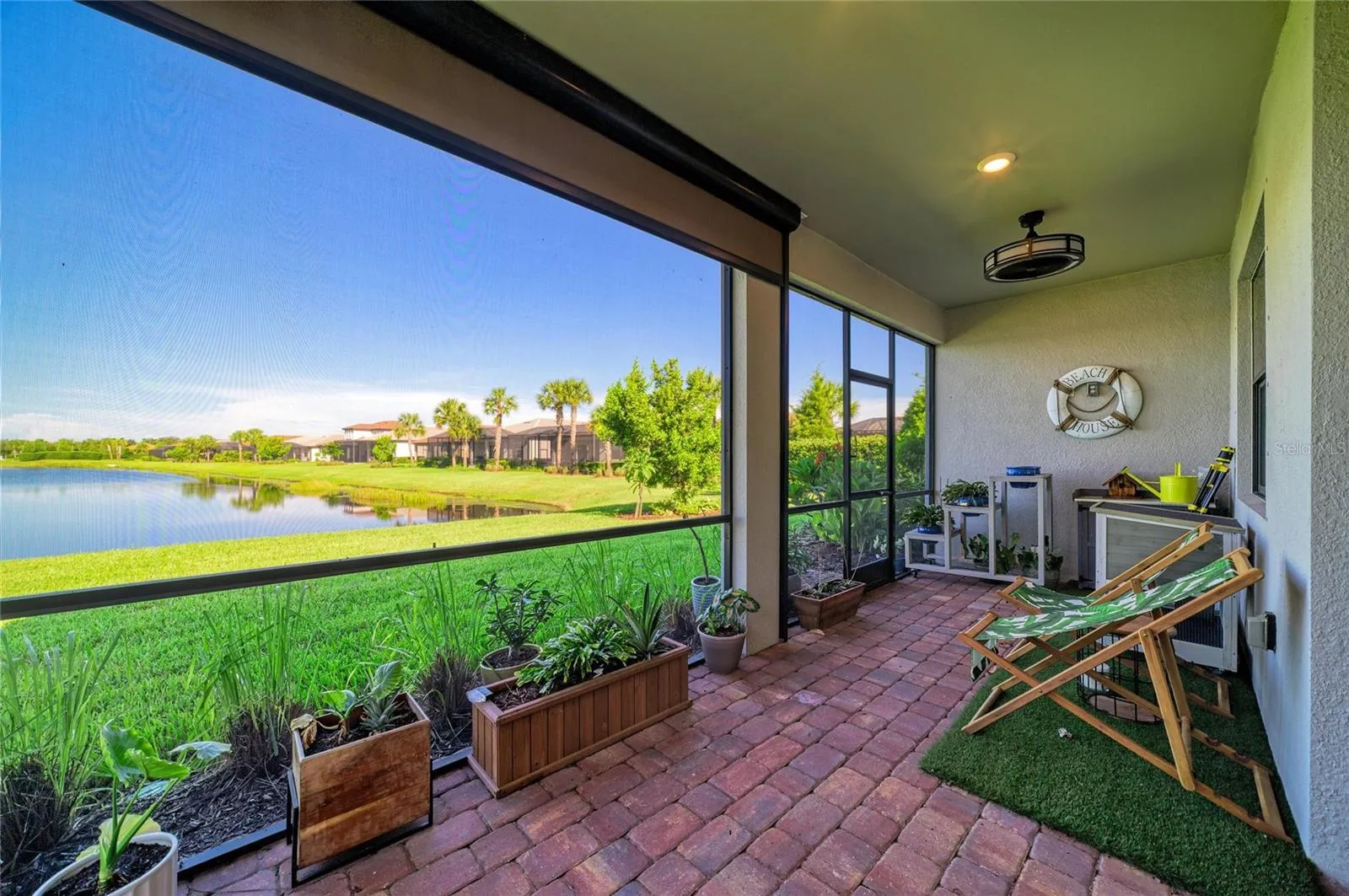Back covered screened paver lanai
