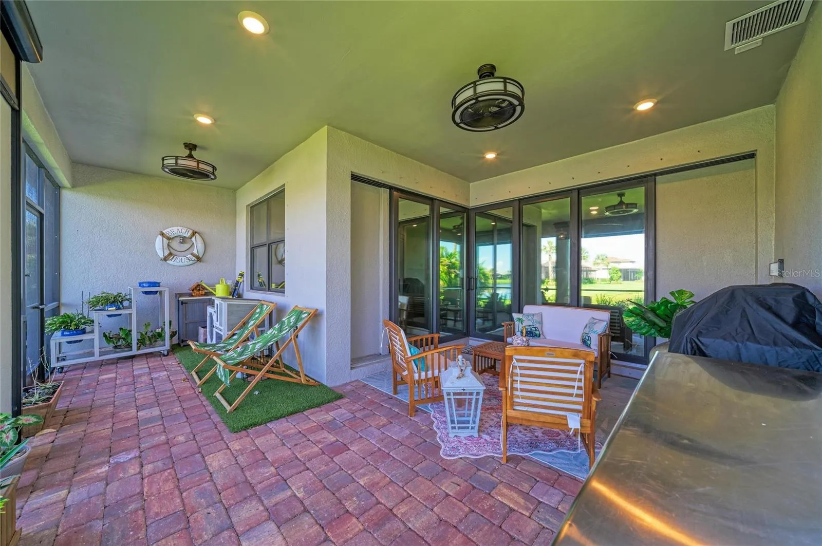 Back covered screened paver Lanai