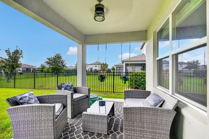 Outside lanai with fully fenced yard