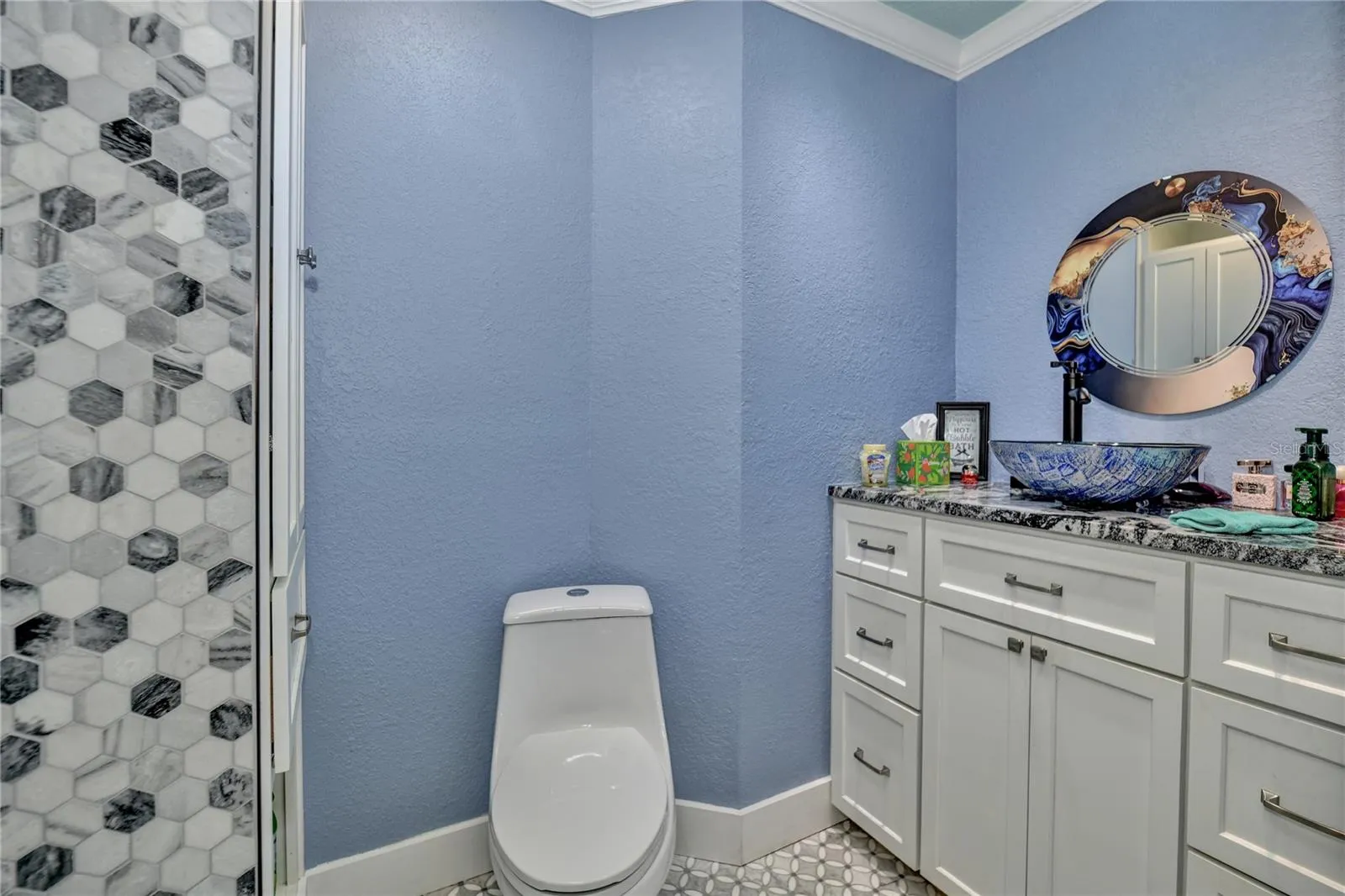 Primary bathroom updated vanity glass &amp; mirror