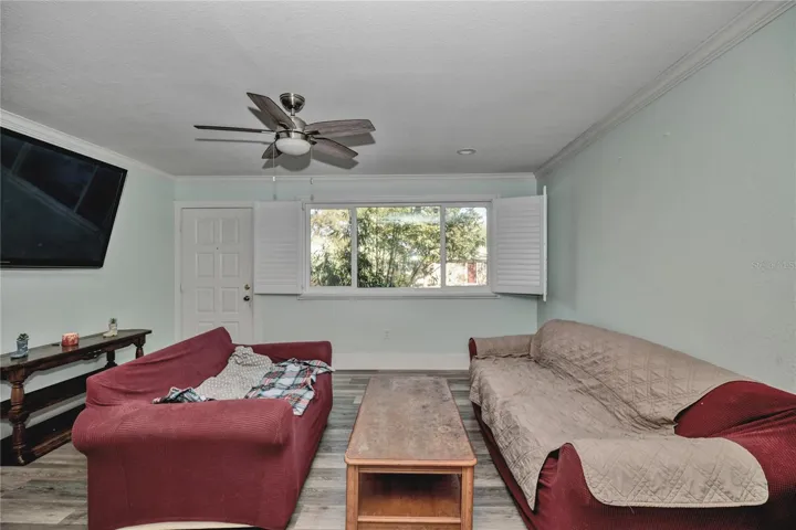 Large window, high ceiling, ceiling fan