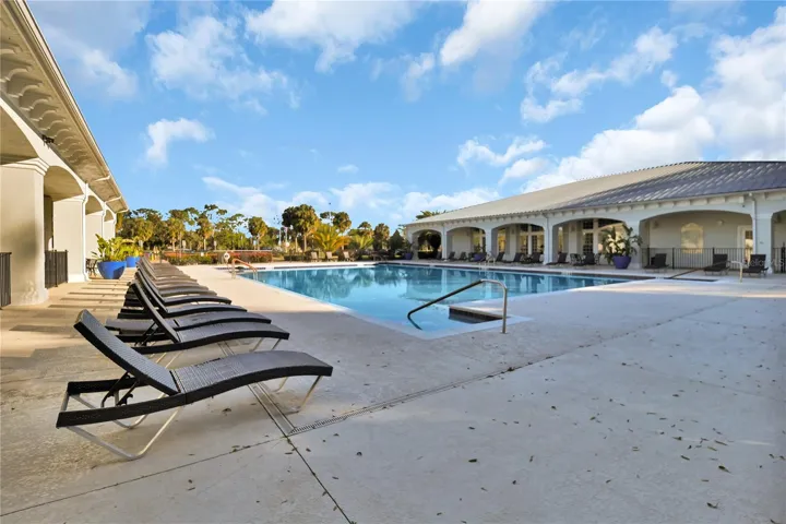 Palm Grove Large lap swimming pool area in Oak Run