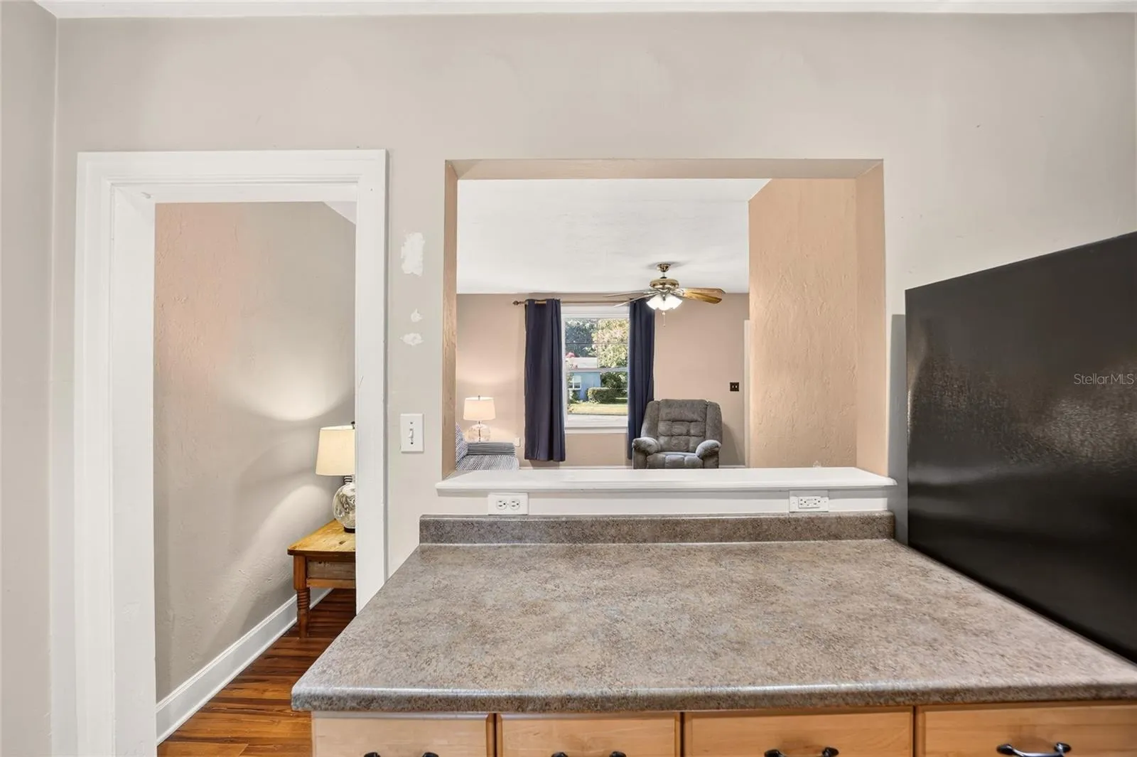 Opens the space allowing more natural light in