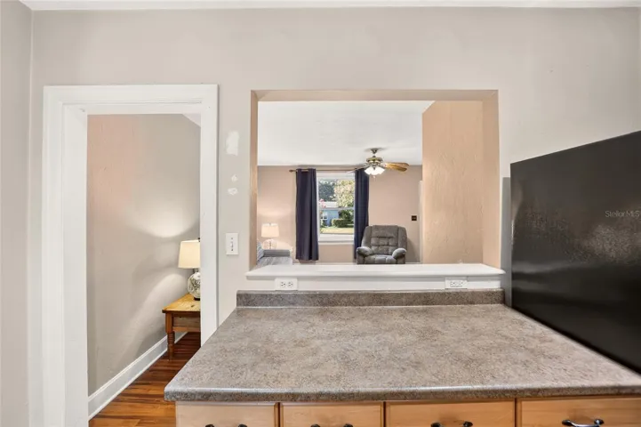 Opens the space allowing more natural light in