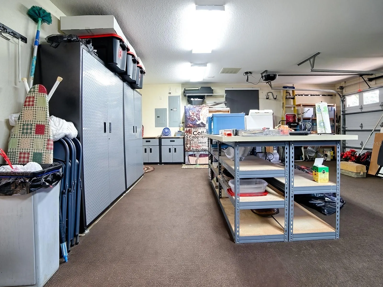 A HOBBYIST'S DELIGHT - AN ORGANIZED AND EXPANDED GARAGE