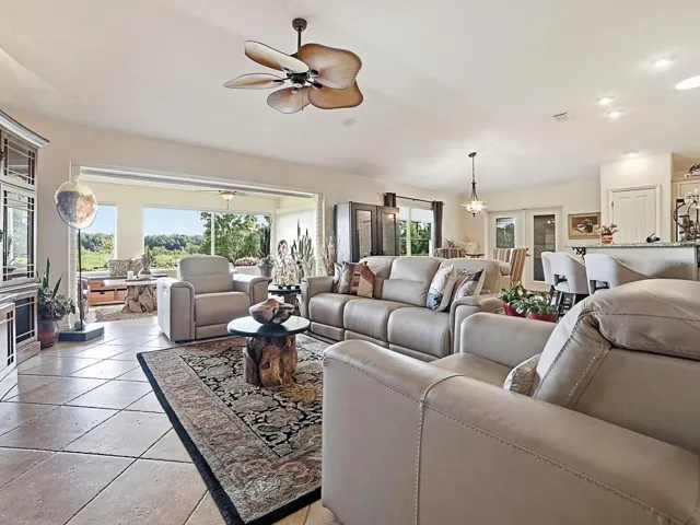 VIEW OF THE MAIN LIVING AREA TO THE OPEN KITCHEN AND YOUR PRESERVE VIEW