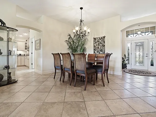 ALL TILE FLOORING IN THE MAIN LIVING/DINING AREA