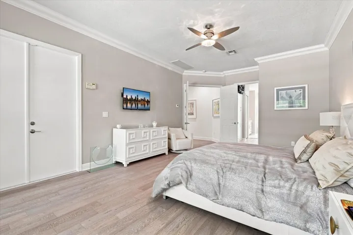 Primary Suite with Doors to Pool