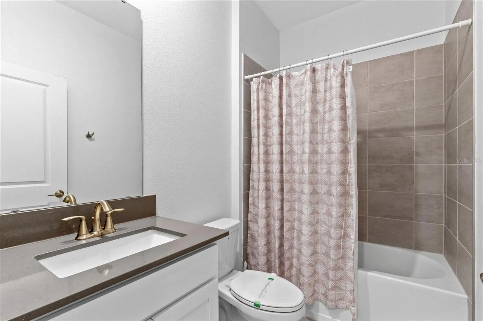 Guest room, full bath, quartz vanities.