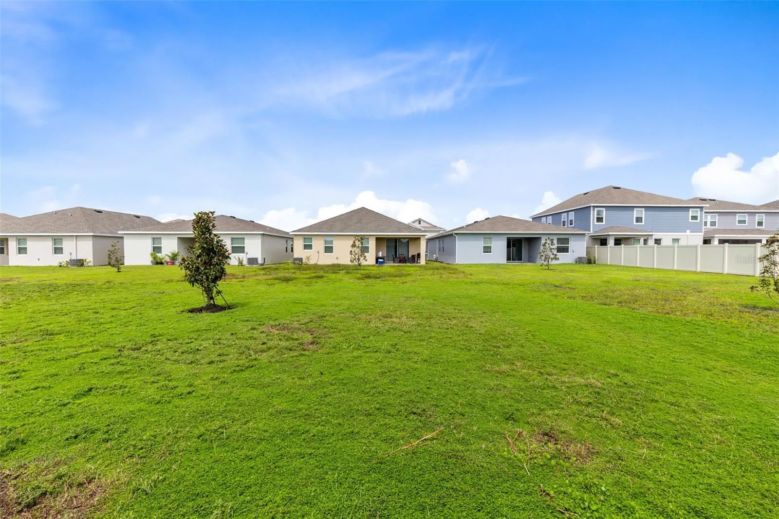 Enjoy the Florida lifestyle from the screened lanai overlooking the backyard, with plenty of room to relax, garden or create your own outdoor retreat.
