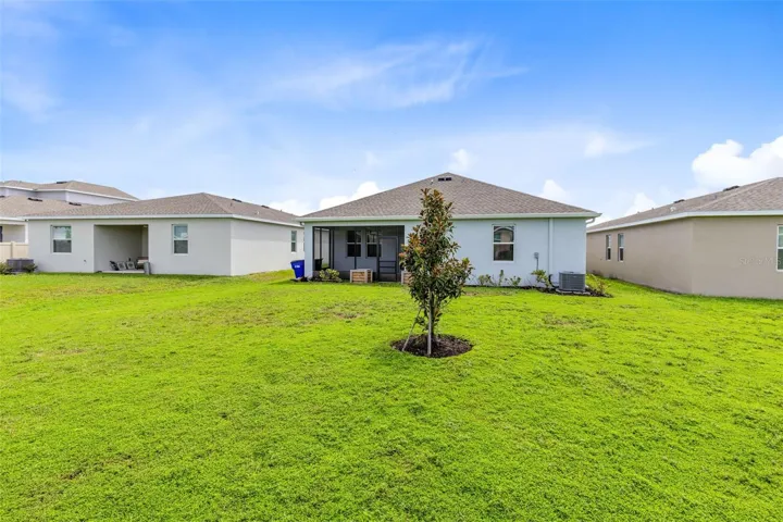 Enjoy the Florida lifestyle from the screened lanai overlooking the backyard, with plenty of room to relax, garden or create your own outdoor retreat.