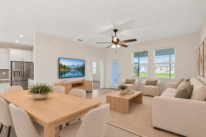 The dining and living spaces flow together beautifully, creating plenty of room for both everyday living and entertaining.