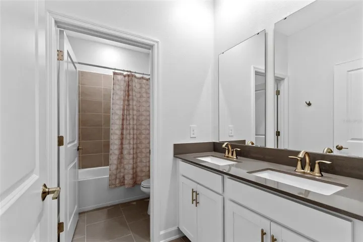 Guest room, full bath, dual quartz vanities.